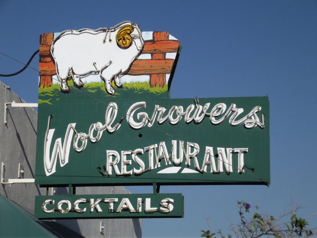 Wool Growers neon sign Basque Restaurant & Cocktail Lounge logo
